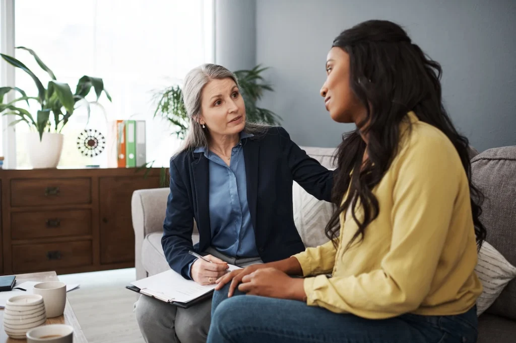 A person participates in therapy at a drug rehab center.